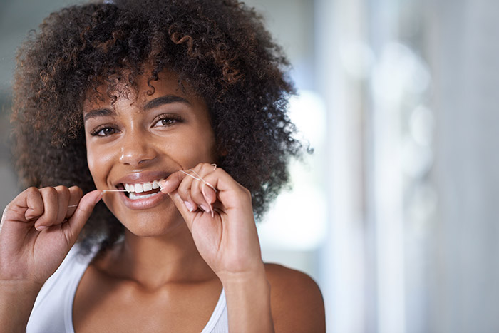 a girl showing her teeth